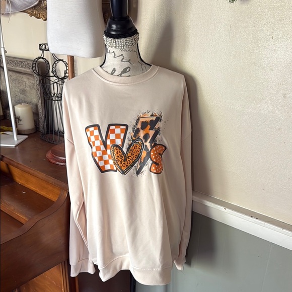 Cream Graphic Sweatshirt with Orange and Black Design - Picture 2 of 3